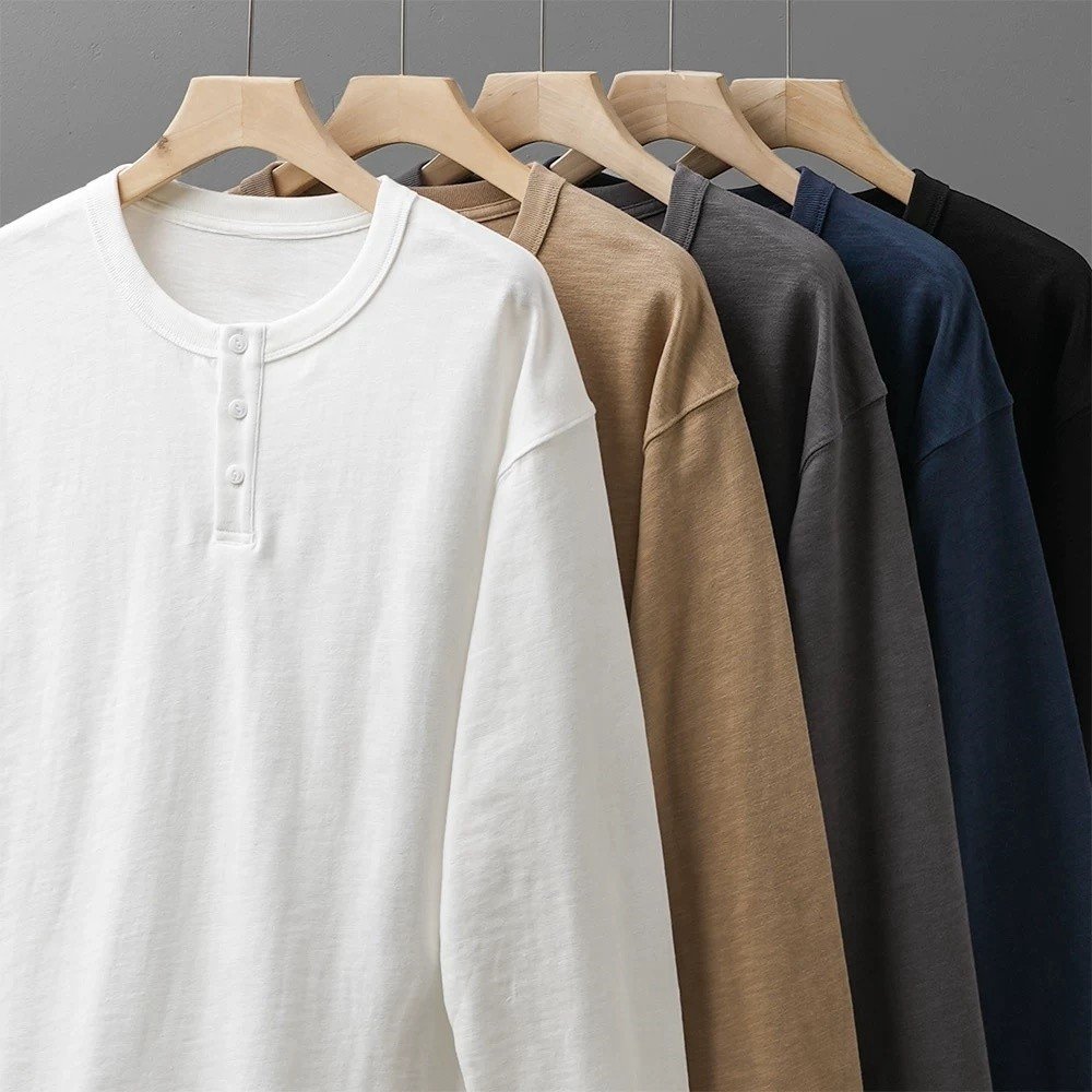 PROMAN เสื้อแขนยาวสีพื้นคอกลม ทุกฤดูร้อนใส่ได้ สไตล์เรียบง่าย สำหรับผู้ชายผู้หญิง ใส่สบายทุกโอกาส เสื้อเชิ้ตสบายๆ